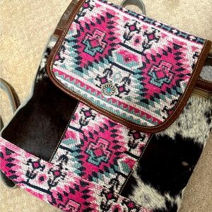 Myra backpack bag. Pretty pink western motif with cow hide.